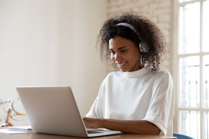 ESL student practicing English language skills with study materials