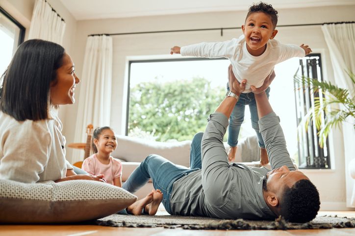 Family enjoying quality time at home while balancing healthcare training