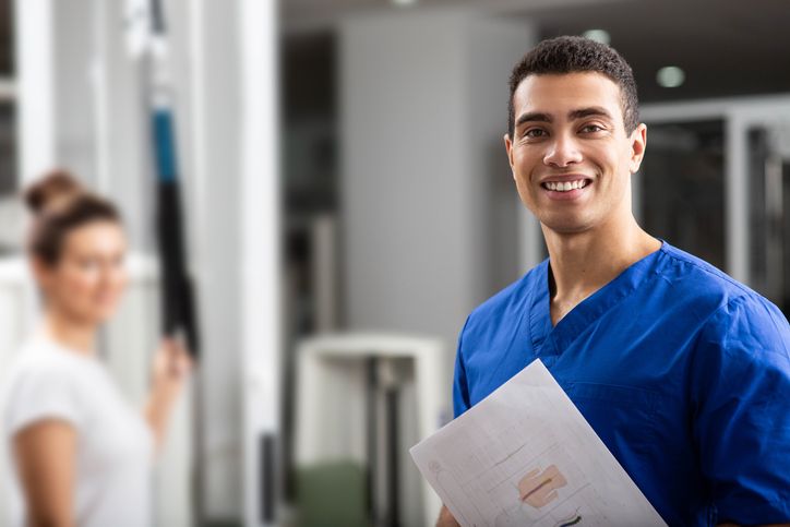 Healthcare professional balancing work tasks in a medical office environment